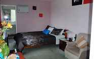Bedroom 2 Purple-Der House Accommodation