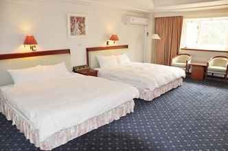 Phòng ngủ 4 Taigin Hotel