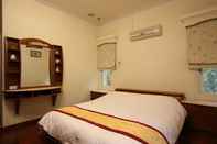 Bilik Mandi dalam Bilik Cheng Long Minsu Guest House