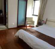 Phòng ngủ 4 Hengqi Kela Hotel