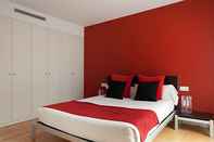 Bedroom Lugaris Beach - Apartments