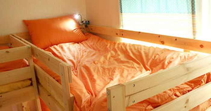 Bedroom C.U. BNB Guest House - Hostel