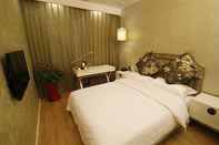Bedroom FX Hotel Zong Bu Ji Di Dian Beijing