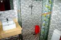 ห้องน้ำภายในห้อง Super 8 Hotel Suzhou Le Yuan
