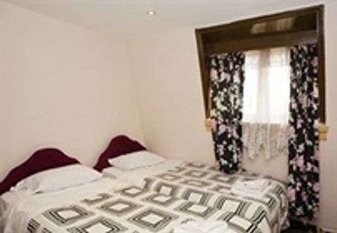 卧室 Andrews House Hotel