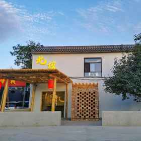 Hotel Exterior1Dunhuang North Poe B&B,敦煌国际饭店-停车场飯店