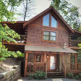 Hotel Exterior 1 Cozy Retreat - Telephone, Hot Tub, Pool Table, Wifi, Grill, Hotel The Island in Pigeon Forge