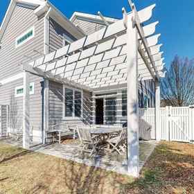 Hotel Exterior 1 Downtown home near the ocean with enclosed yard, WiFi, AC & beach gear - dogs OK, Sarangi Satyajit MD Hotels