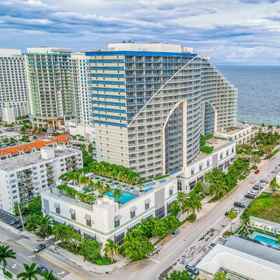 Hotel Exterior118th Floor, Snowbird-Friendly Condo with Shared Pool, Ocean View, and Fast WiFi,拉斯奥拉斯河滨飯店