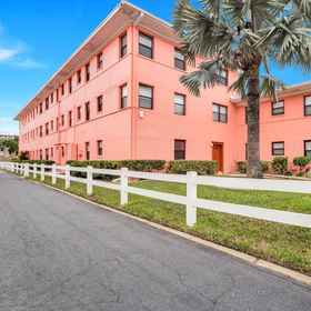 Hotel Exterior 1 Patio with Pool View and Coastal Décor - Charming Ground Floor Escape, Hotel Pinellas County