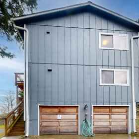 Logo1Woodsy retreat near the beach with WiFi, washer/dryer & gas fireplace,Oceanside Ocean Front Cabins飯店