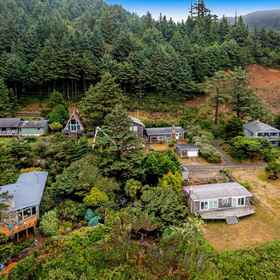 Logo1Radar Road Retreat Vacation Rental,Oceanside Ocean Front Cabins飯店