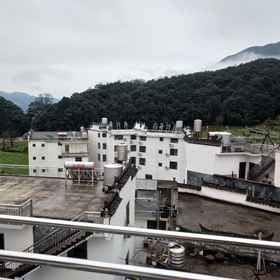 Hotel Exterior 1 Jiangling Hexie Shanzhuang Hostel, Hotel Baima Wholesale Department