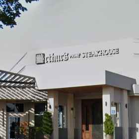 Hotel Exterior 1 Backyard Patio with Fire Pit and Lounge Seating - Stylish Oasis, Hotel Robinson Center