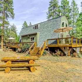 Hotel Exterior 1 Delightful cabin with lofted layout, hot tub, modern kitchen, WiFi & shared pool, Deschutes County Hotels
