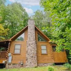 Hotel Exterior 1 Year-Round Christmas Vibes with Hot Tub and Creek View - Cozy Enchanting, The Island in Pigeon Forge Hotels