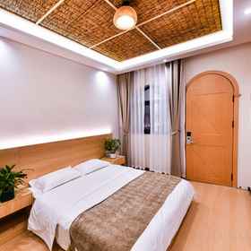 Hotel Exterior1Dunhuang Yiju Homestay,敦煌国际饭店-停车场飯店