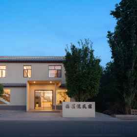 Hotel Exterior1XiLaiyue Homestay,敦煌国际饭店-停车场飯店