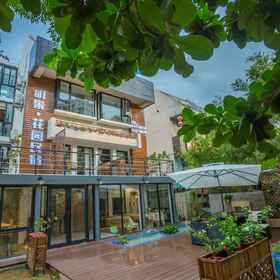 Logo1Haikou Mingguo Garden Homestay,蓝色海洋快餐飯店