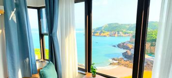 Others 2 Happy Hour Seaview Apartment (Bayuquan Hongji Branch)