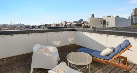Others 2 Rooftop Patio and High-End Kitchen Amenities - Charming Urban Oasis