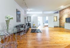 Others 6 Spacious Living Area and Cozy Dining Space - Charming Urban Retreat