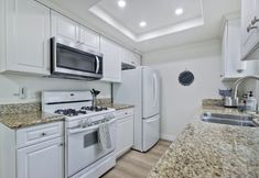 Others 6 Modern Kitchen and Private Balcony - Stylish Coastal Escape