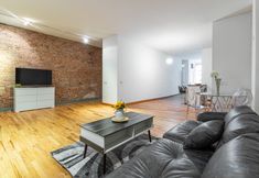 Others 5 Spacious Living Area and Cozy Dining Space - Charming Urban Retreat