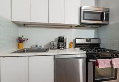 Others 2 Spacious Living Area and Cozy Dining Space - Charming Urban Retreat