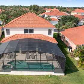 Hotel Exterior 1 Screened-in Pool and Game Room - Amazing Family Escape, โรงแรม & ที่พัก Calabay Palms Villa