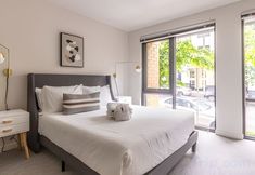 Others 6 Spacious Living and Gourmet Kitchen - Stylish Urban Oasis