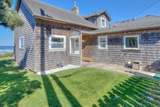 Others Oceanfront Deck and Cozy Interior - Charming Coastal Escape