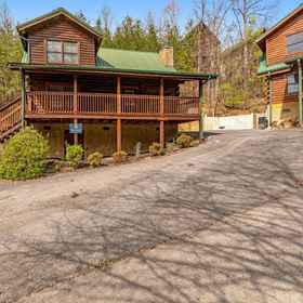 Hotel Exterior 1 Arrowhead Log Cabin Resort - A Barefoot Landing Cabin, The Island in Pigeon Forge Hotels