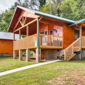 Logo 1 Riverfront Views and Hot Tub Retreat - Charming Log Cabin, The Island in Pigeon Forge Hotels