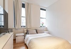 Others 3 Spacious Living Area and Cozy Dining Space - Charming Urban Retreat