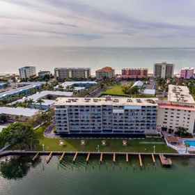 Logo 1 Gorgeous Intracoastal Views and Tennis Courts - Stunning Coastal Retreat, Hotel Pinellas County