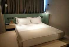 기타 5 Yixiangge business and tourism apartment (Century Huayang store, Wanda Plaza, Luoyang)