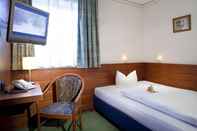 Phòng ngủ Hotel Alpinpark