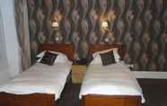 Kamar Tidur 4 Town House Hotel 