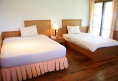 Bedroom 6 Orchid Suites