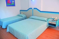 Kamar Tidur Karat Hotel