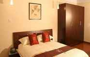 Kamar Tidur 4 Dingtian Ruili Service Apartment Hotel