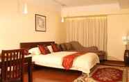 Kamar Tidur 7 Dingtian Ruili Service Apartment Hotel