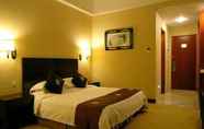 Kamar Tidur 3 July Plaza International Hotel