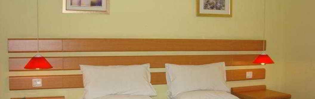 Kamar Tidur Home Inn Longdong Avenue