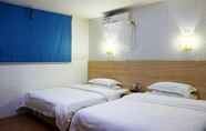 Kamar Tidur 2 Home Inns Guo Mao