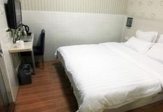 침실 7 Home Inns Guo Mao