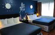 Kamar Tidur 6 Golden Bear Hotel SureStay Collection By BW