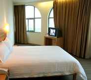 Bedroom 4 City Inn Yuandong