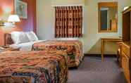 Bedroom 6 Rodeway Inn
